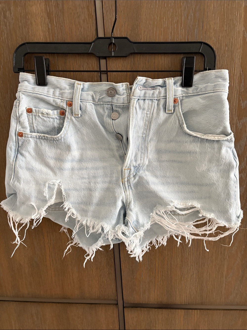 Light Wash Distressed Denim Shorts - Women's